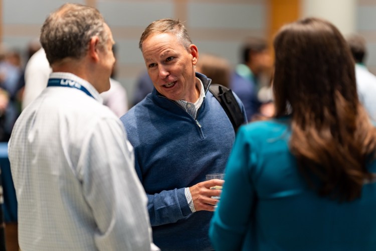 People collaborating at the Cox Cleantech LIVE event